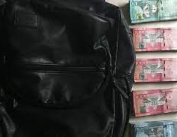 PN apresa mensajero por auto robo de RD$800 mil